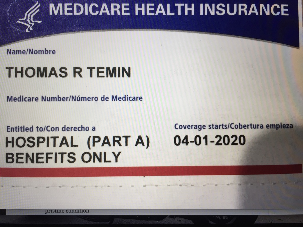 Medicare health insurance card with details.